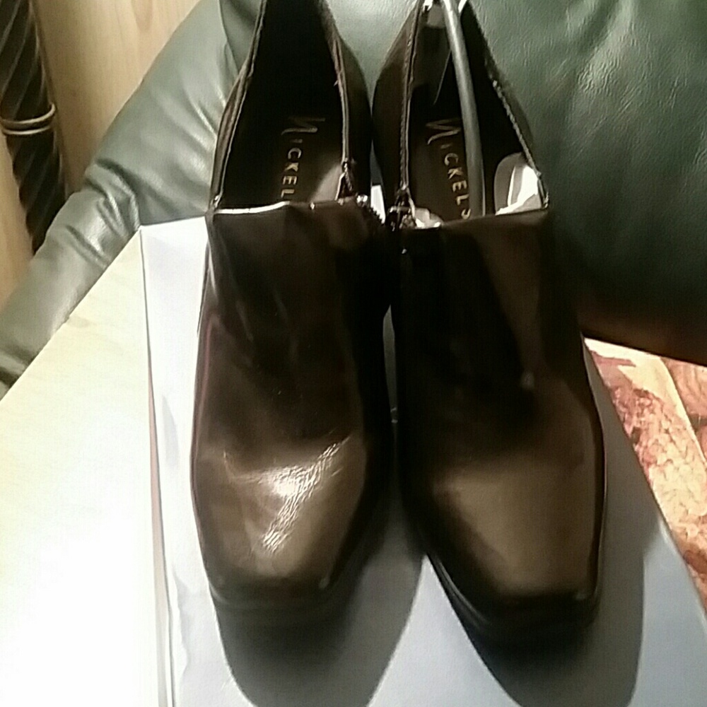 Brown high heels.